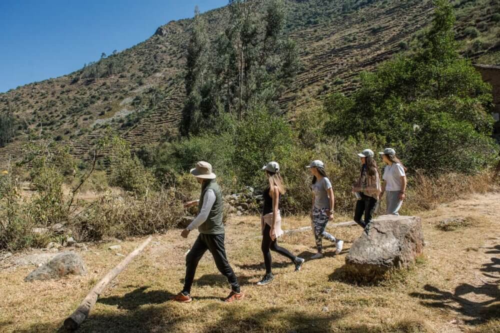 Group hiking at Pumamarca