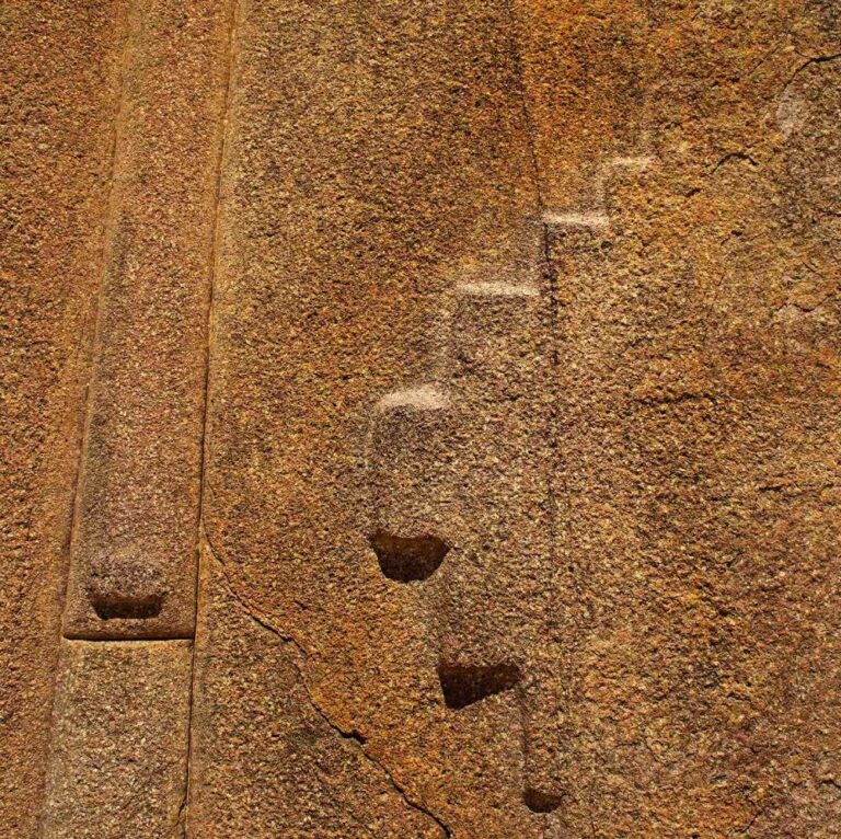 Detail of Chakana on Pink Granite (Rhyolite) Megalithic Rock Ollantaytambo