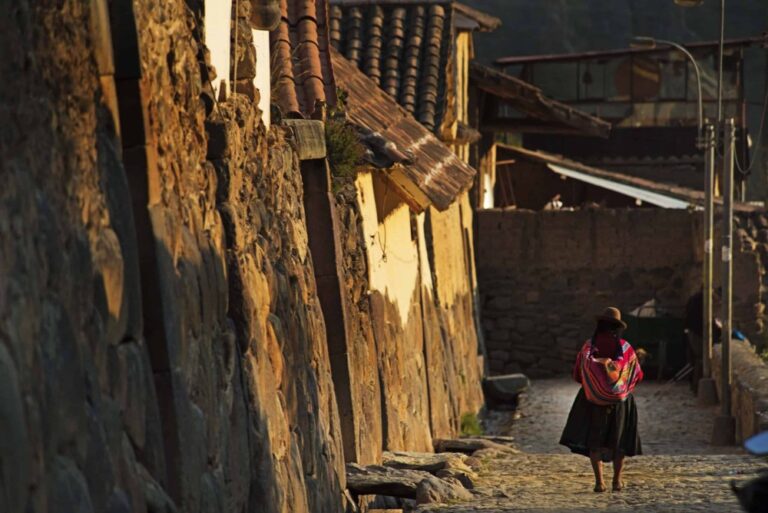 Ollantina on her way to buy at the market