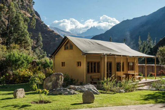 Group tent in Ollantaytambo hotels near Machu Picchu surrounded by nature