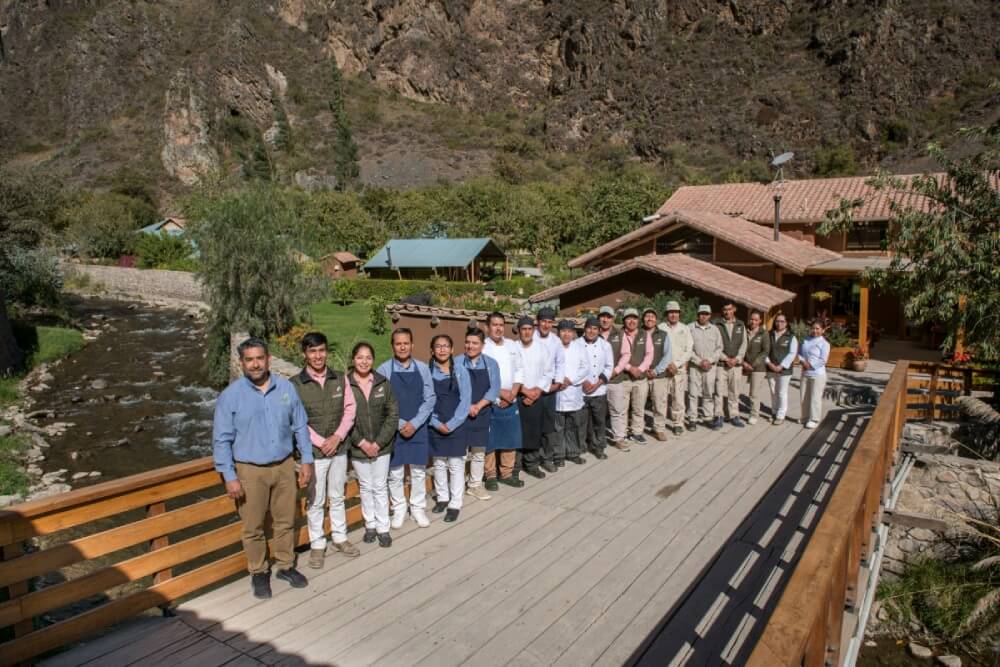 Staff at Las Qolqas ecolodge Ollantaytambo Peru